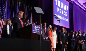 NEW YORK, NY - NOVEMBER 09: Republican president-elect Donald Trump delivers his acceptance speech as members of his family and members of Vice president-elect Mike Pence's family look on during his election night event at the New York Hilton Midtown in the early morning hours of November 9, 2016 in New York City. Donald Trump defeated Democratic presidential nominee Hillary Clinton to become the 45th president of the United States.   Chip Somodevilla/Getty Images/AFP == FOR NEWSPAPERS, INTERNET, TELCOS & TELEVISION USE ONLY ==